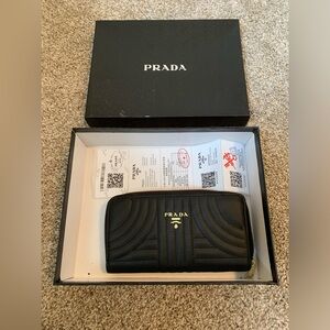 Prada Black Quilted Leather Zip Wallet with Gold Logo